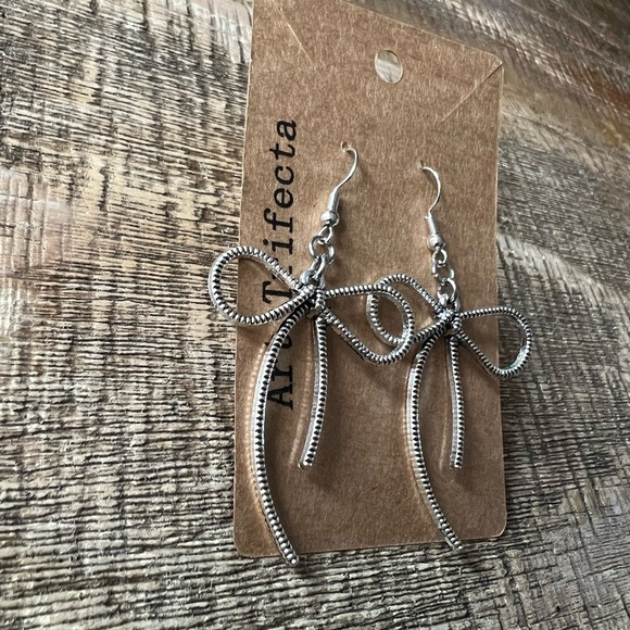 Large Silver Metal Bow Earrings by ArtTrifecta | Stainless Steel Hooks - Picture 3 of 3